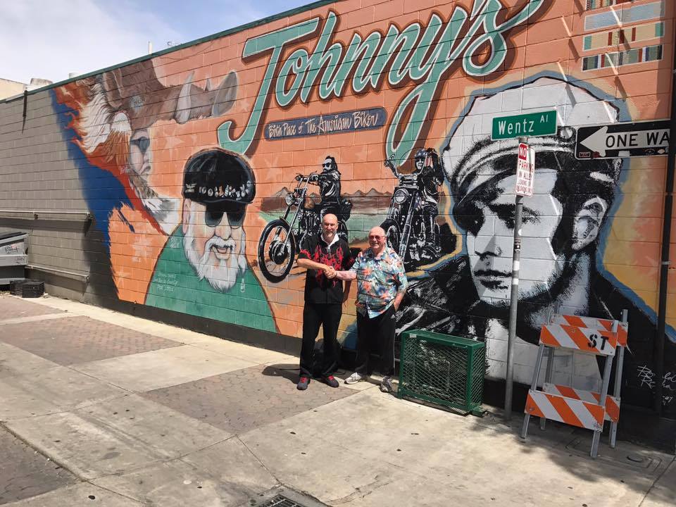 Photo at Johnny's Bar and Grill in downtown Hollister, featuring Mike Corbin and Randy Burke, each major players in the biker rally