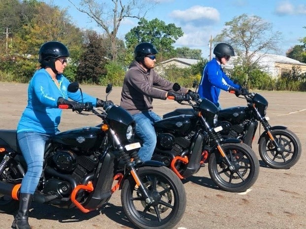 Three Harley Davidson riders, Hollister, California